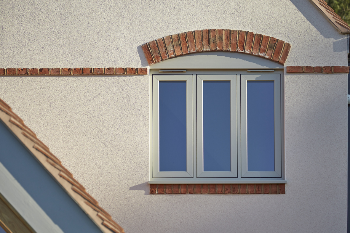 exterior view of sage green flush sash windows