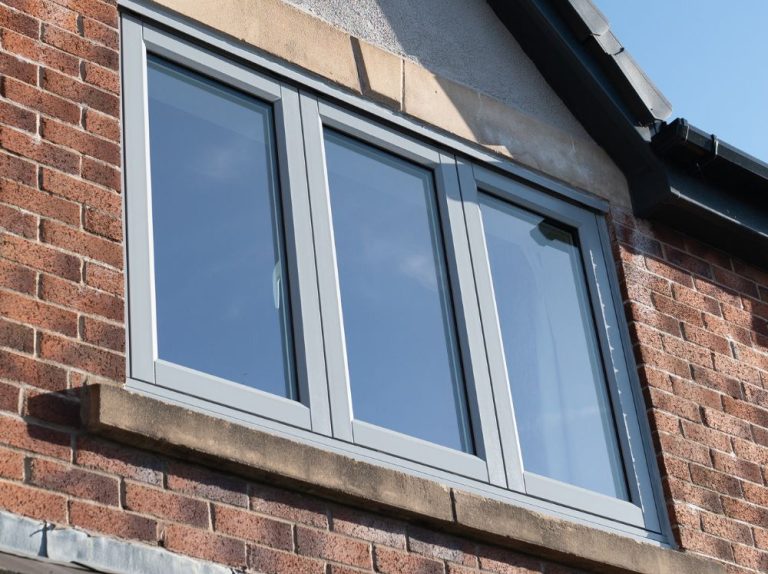 exterior view of sage green flush sash windows